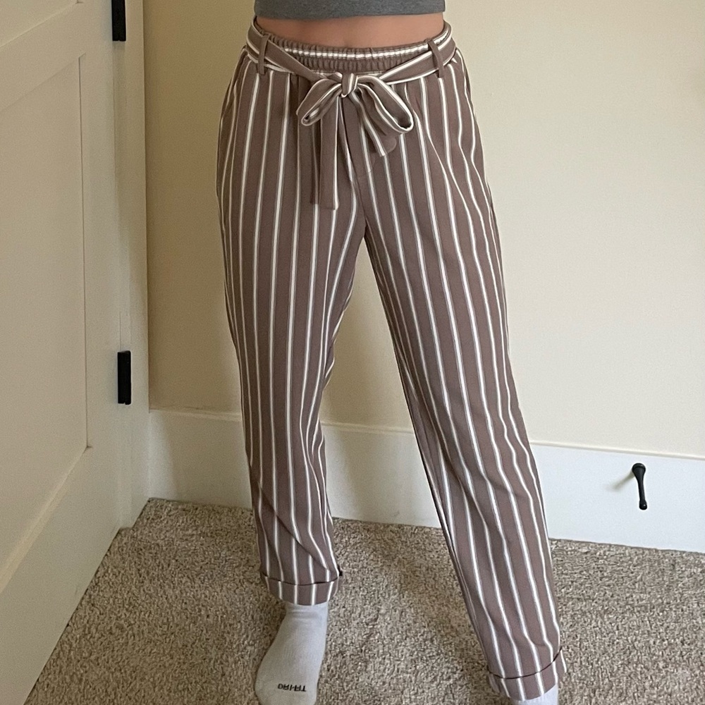 Striped mauve and white dress pants.